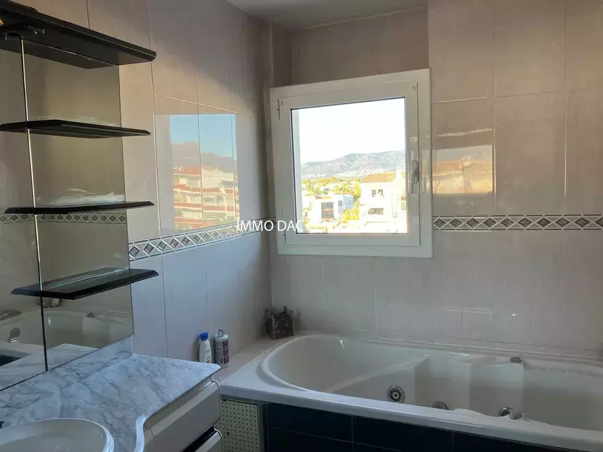 Canal view apartment with terrace for sale Empuriabrava